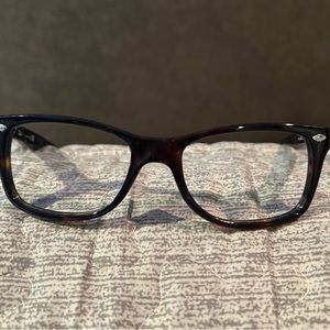 Rayban glasses frame.   Never worn.   Not a good fit on my face.